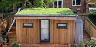 An example of Wallbarn's M-Tray modular green roof solution installed on a garden building